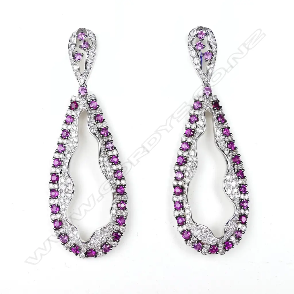 A pair of 18ct white gold ruby and diamond drop earrings Image 1++