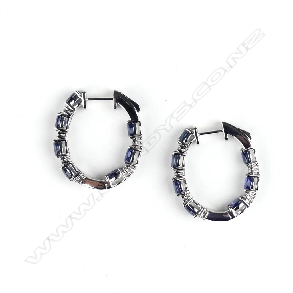 A pair of 14ct white gold sapphire and diamond hoop earrings Image 1++
