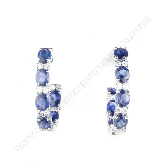 A pair of 14ct white gold sapphire and diamond hoop earrings