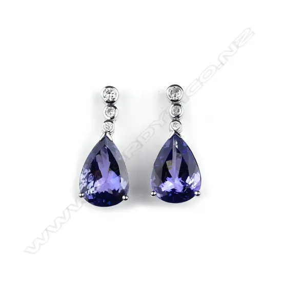 A pair of 14ct white gold tanzanite and diamond drop earrings