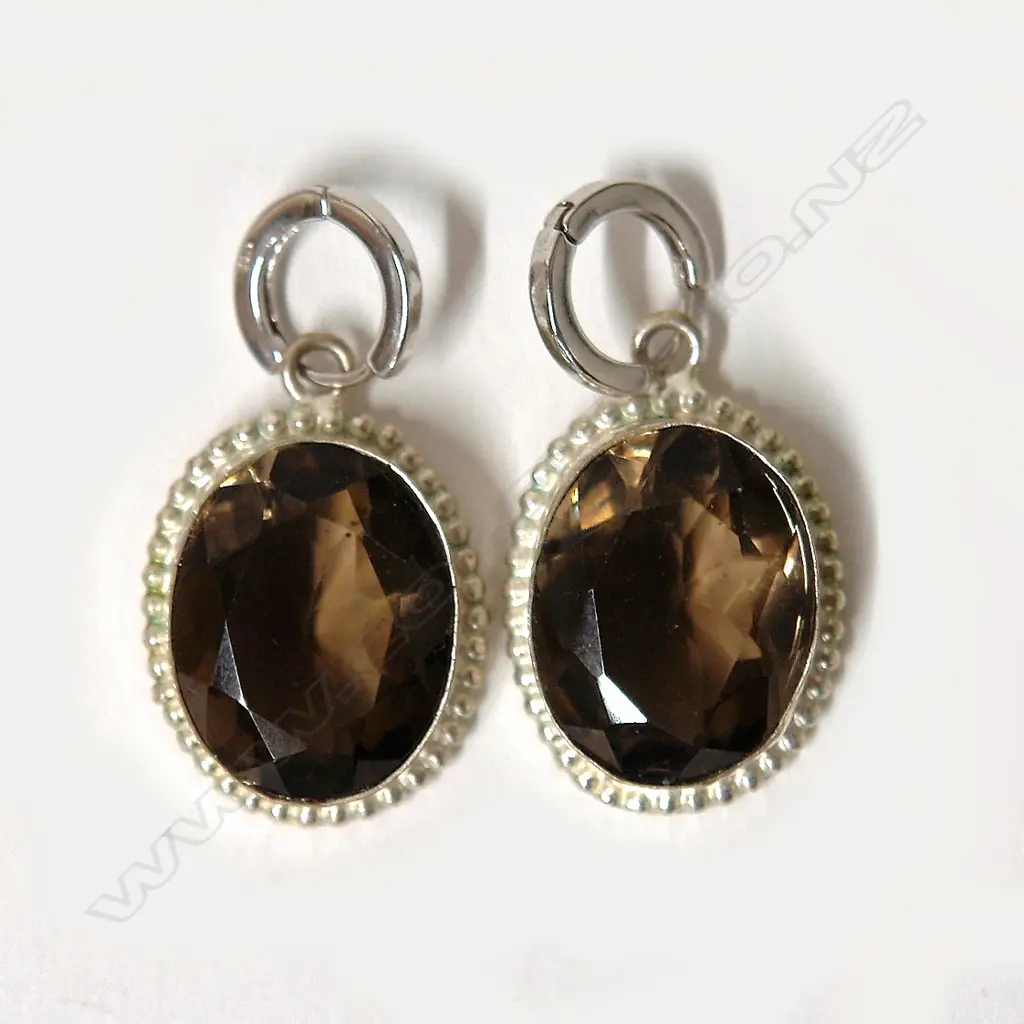 A pair of large topaz and silver earrings Image 1++