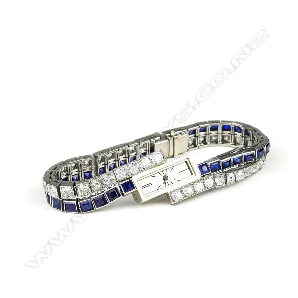 A lady’s platinum and diamond wristwatch Image 1++