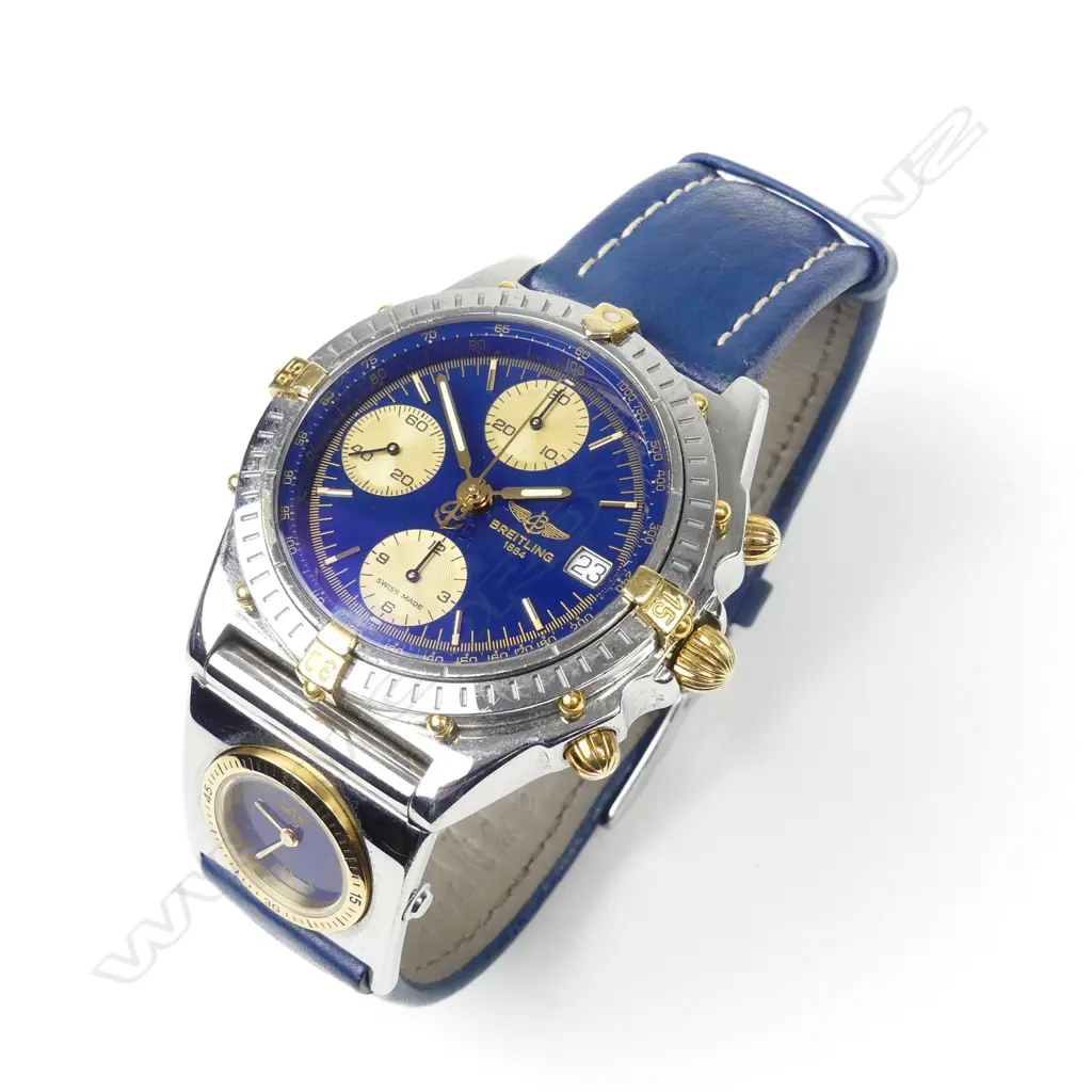 A gent's 18ct gold and stainless steel Breitling Chronomat wristwatch Image 1++