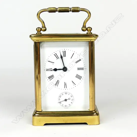 A French brass corniche cased carriage clock
