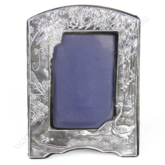 A Japanese Meiji inspired English silver photo frame
