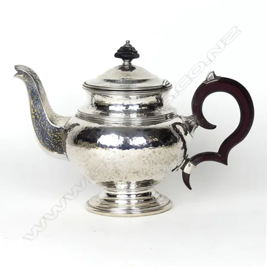 A historical New Zealand silver pedestal teapot by Fred Money