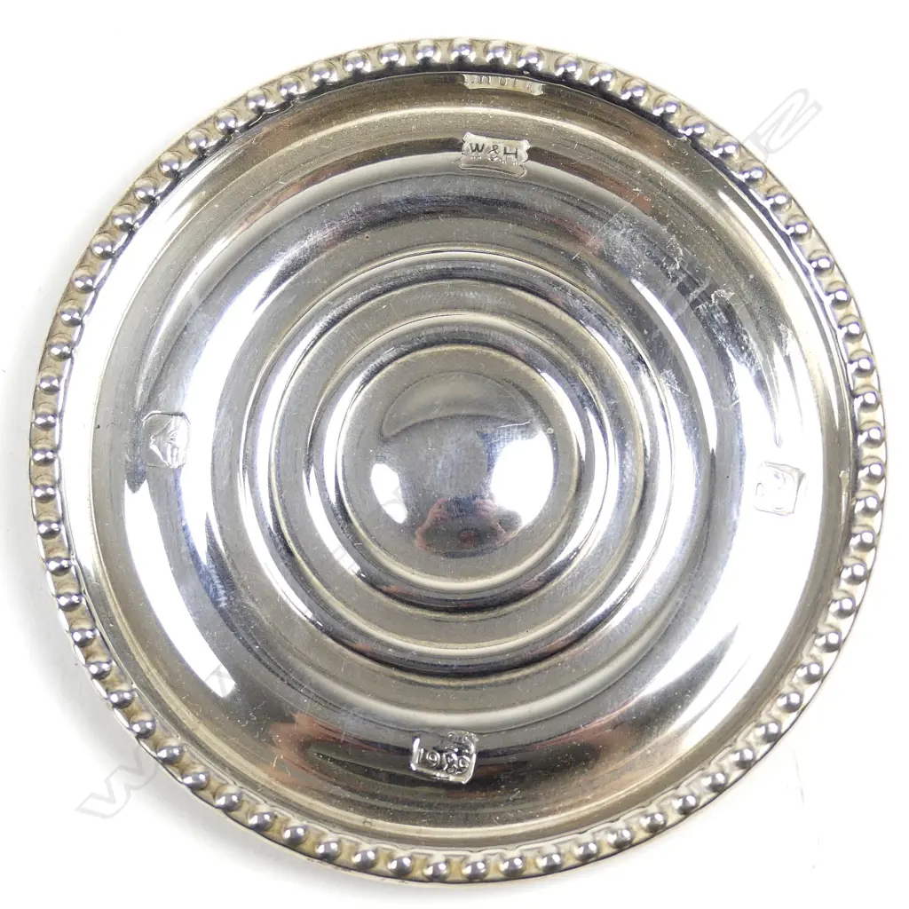 A set of nine New Zealand silver wine glass coasters Image 1++