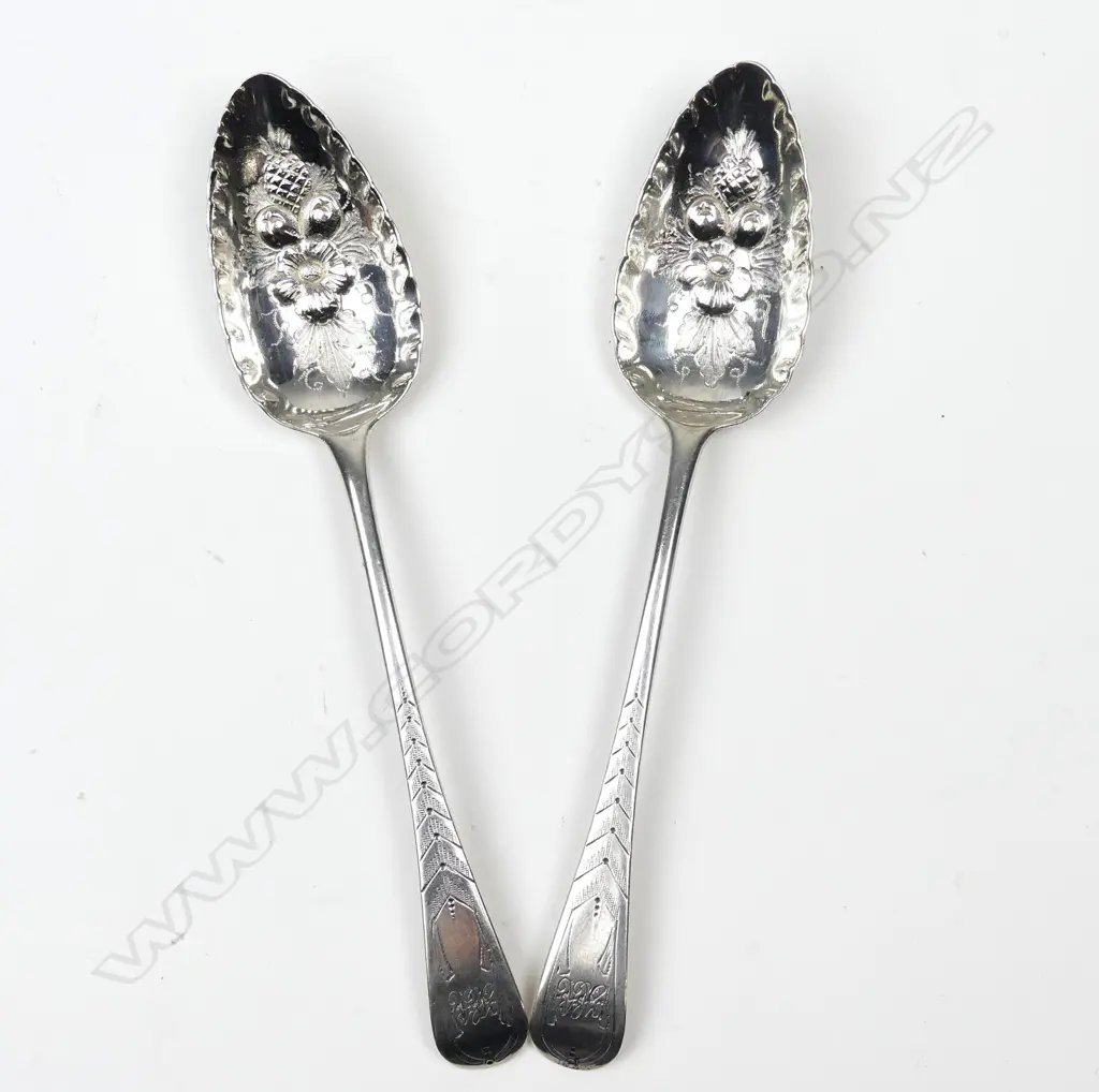 A pair of George III silver berry spoons Image 1++