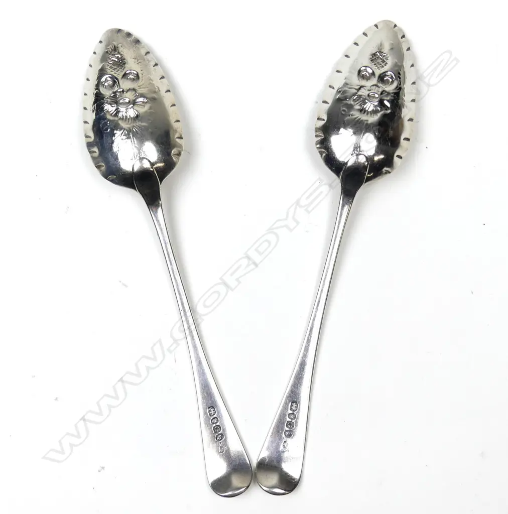 A pair of George III silver berry spoons Image 1++