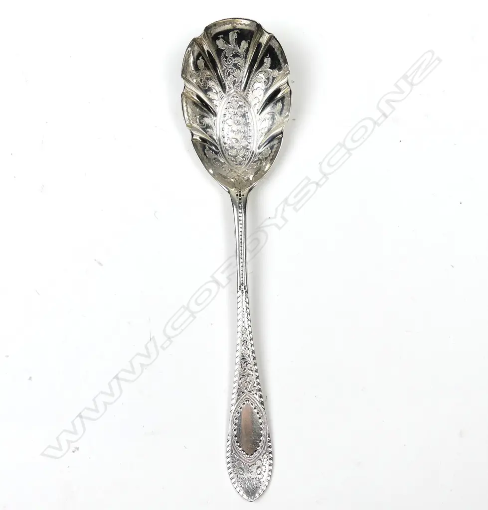 An Edwardian silver fruit serving spoon Image 1++