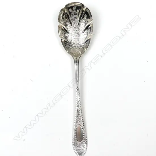An Edwardian silver fruit serving spoon