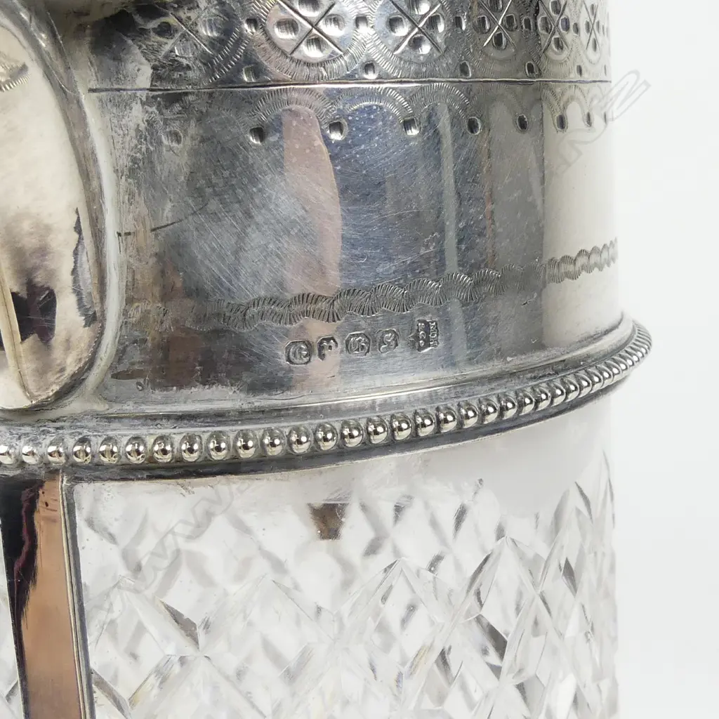 A silver plate and crystal claret jug Image 1++
