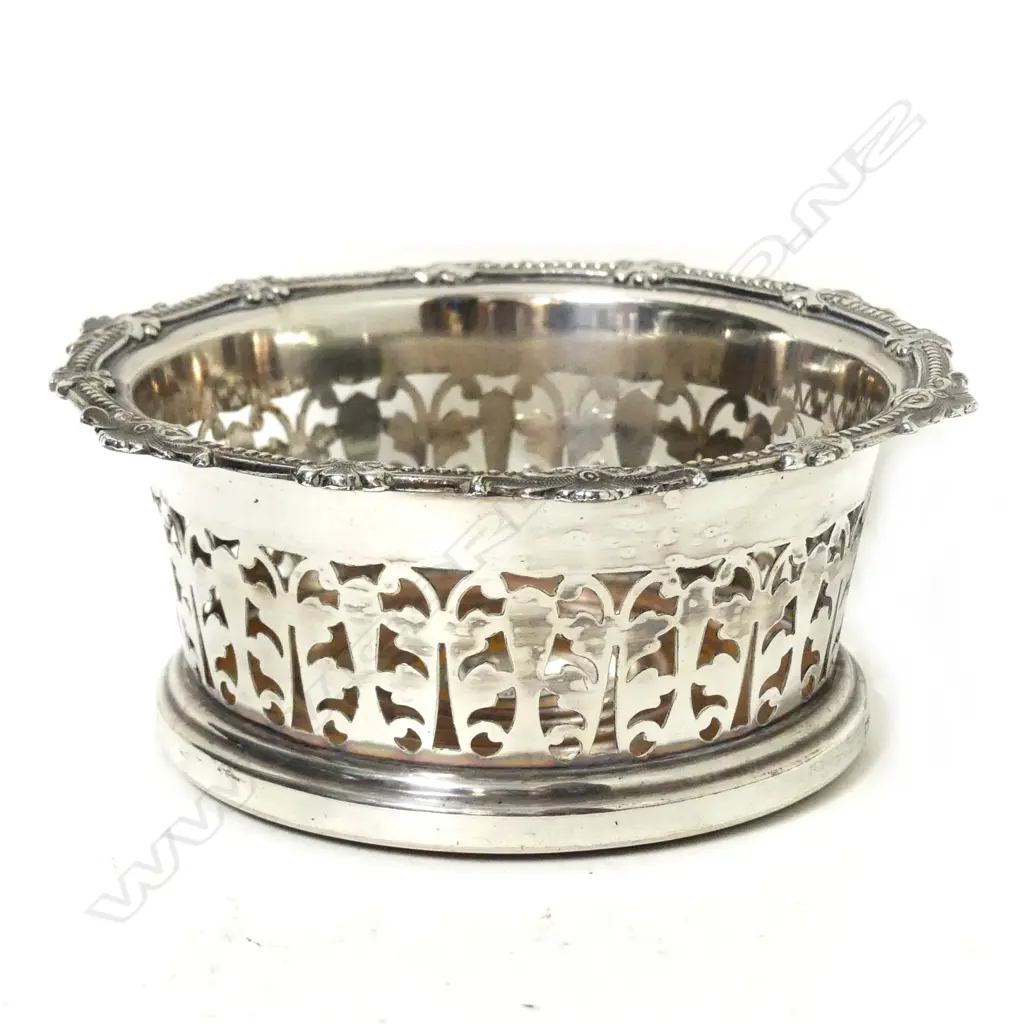 A Victorian silver plated decanter/bottle coaster Image 1++