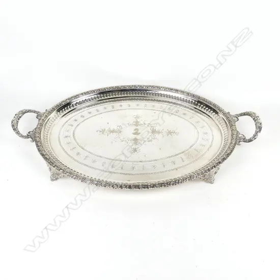 A large silver plated banquet tray