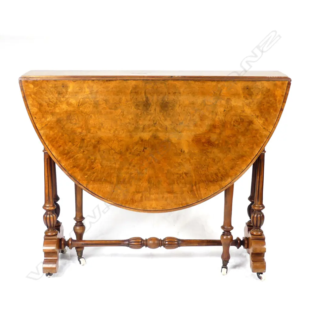 A Victorian walnut Sutherland table Image 1++