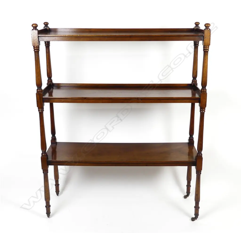 A Victorian mahogany dumb waiter Image 1++