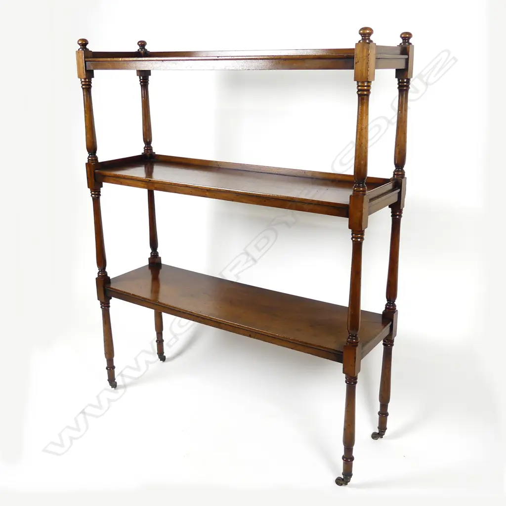 A Victorian mahogany dumb waiter Image 1++