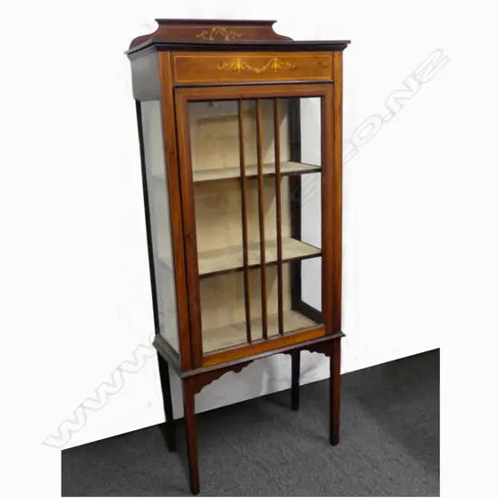 An Edwardian Sheraton revival display cabinet