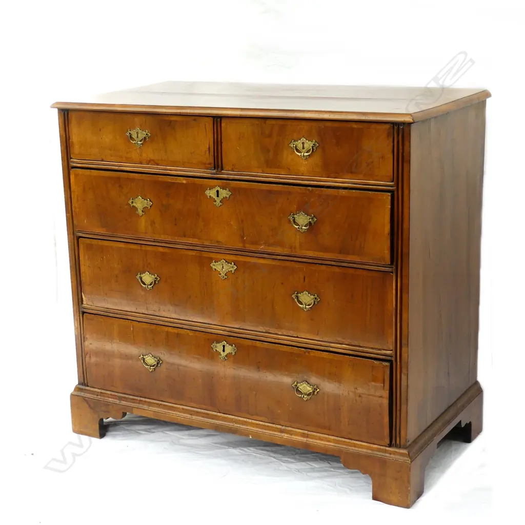 An early Georgian walnut five drawer flat front chest Image 1++