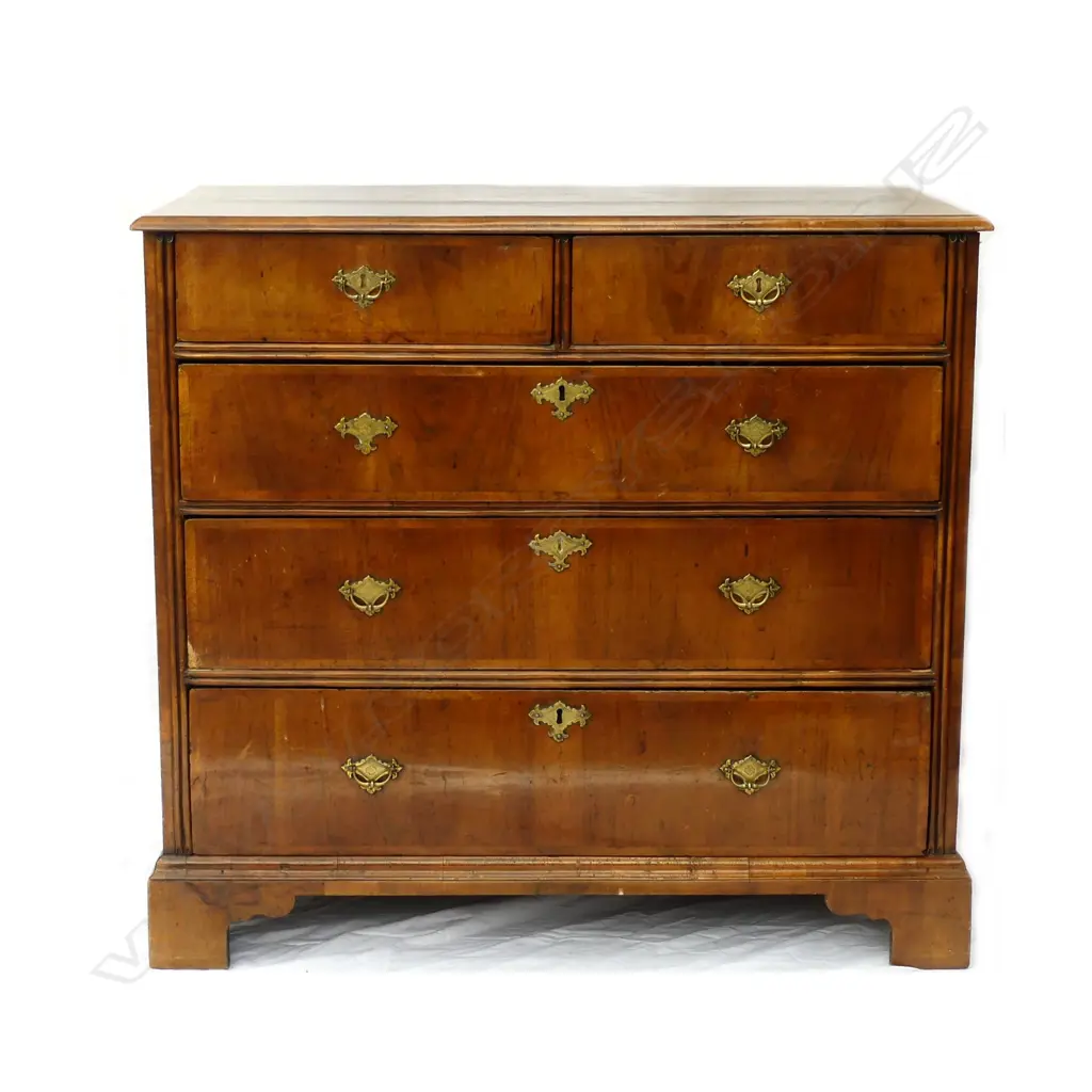 An early Georgian walnut five drawer flat front chest Image 1++