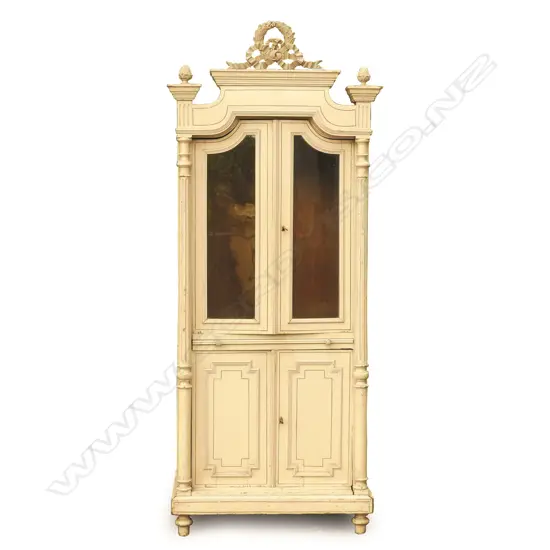 An old French paint finish bookcase cabinet with two glazed doors