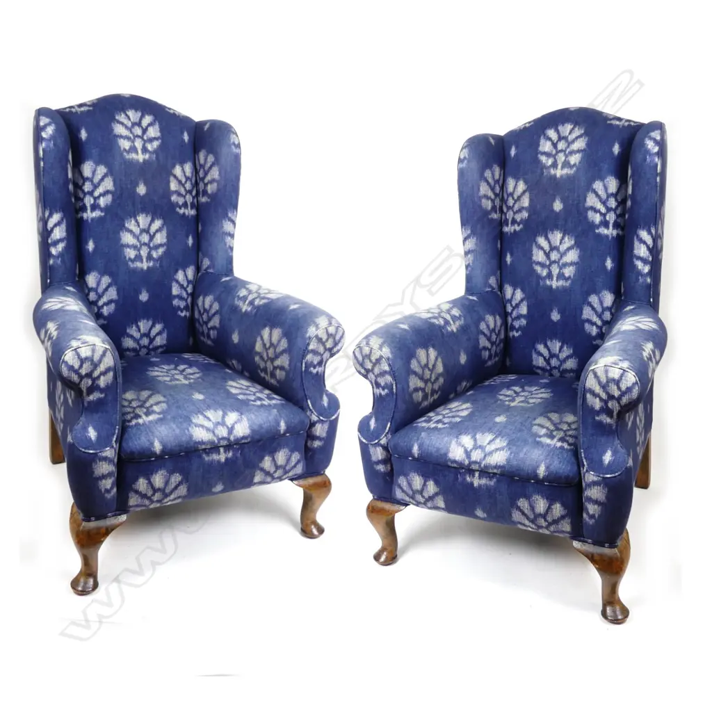 A pair of George II style wing back armchairs Image 1++