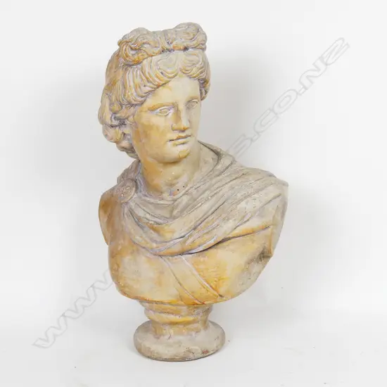 A vintage cast concrete bust of a classical Greek man
