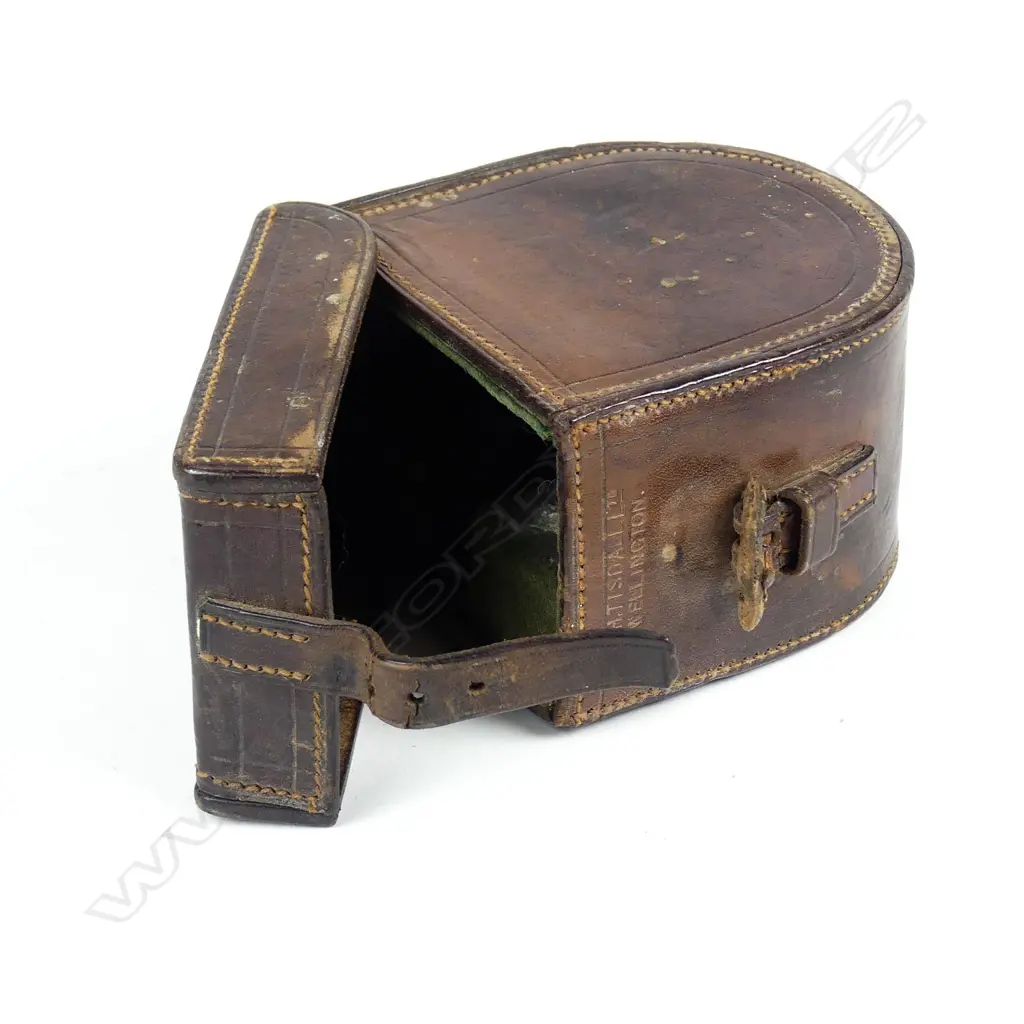 A leather reel case stamped 'W.H.Tisdall Ltd Wellington' Image 1++