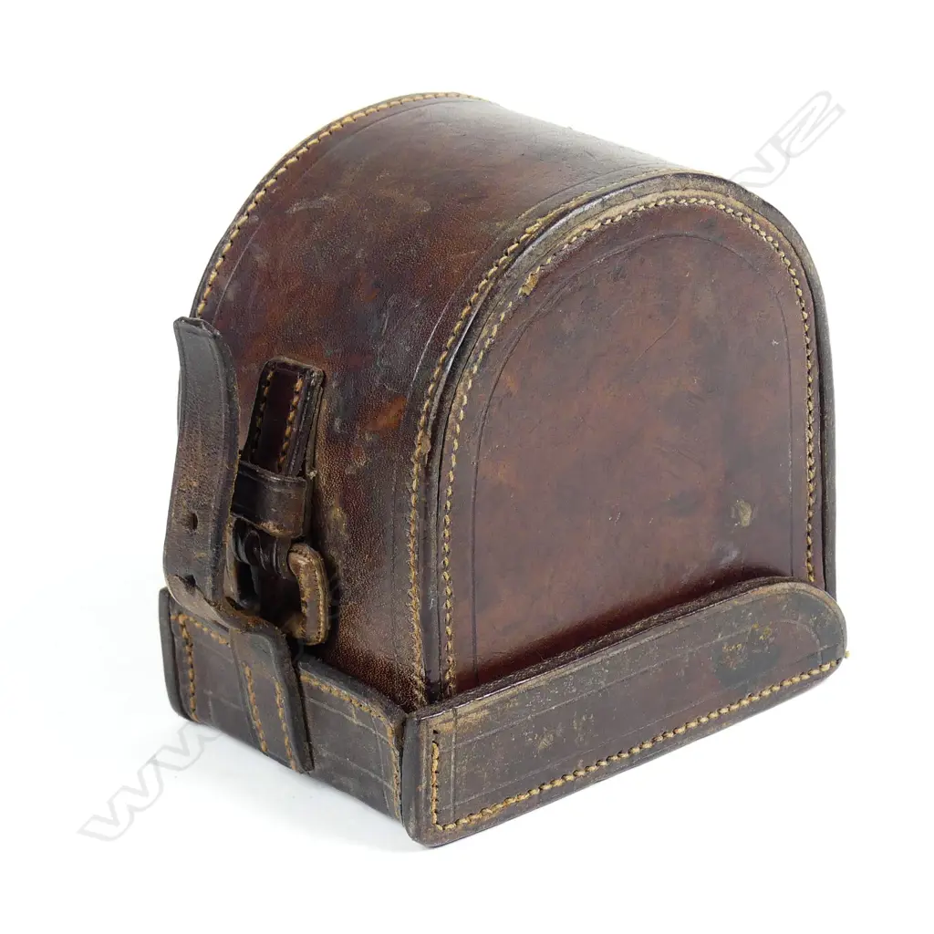 A leather reel case stamped 'W.H.Tisdall Ltd Wellington' Image 1++