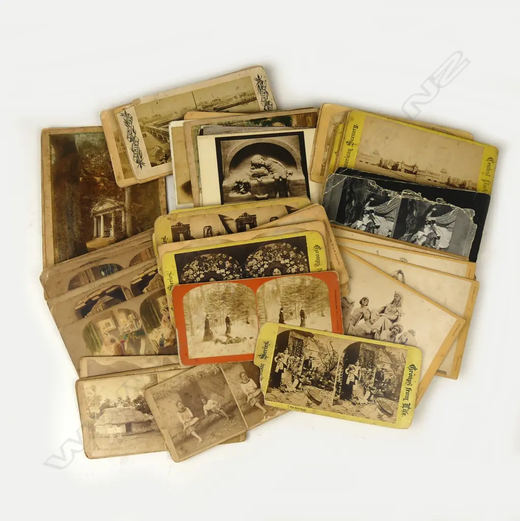 A collection of approximately 80 vintage stereoscopic cards Image 1++