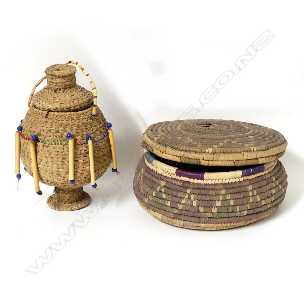 An African woven grass container Image 1++