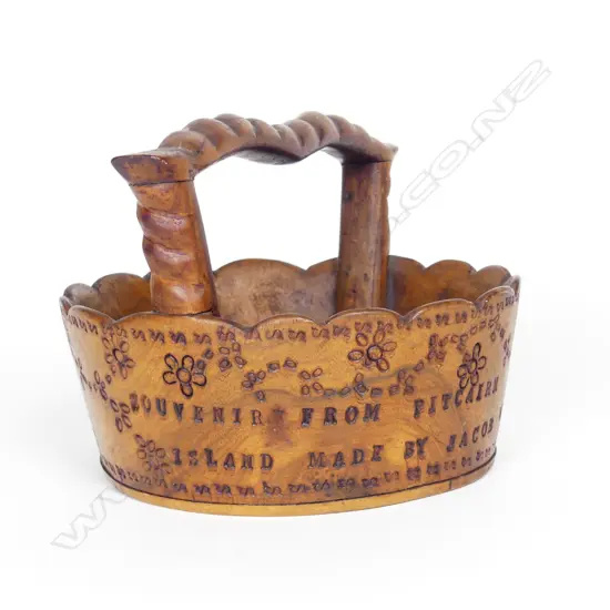 An uncommon vintage Pitcairn Island miro wood basket
