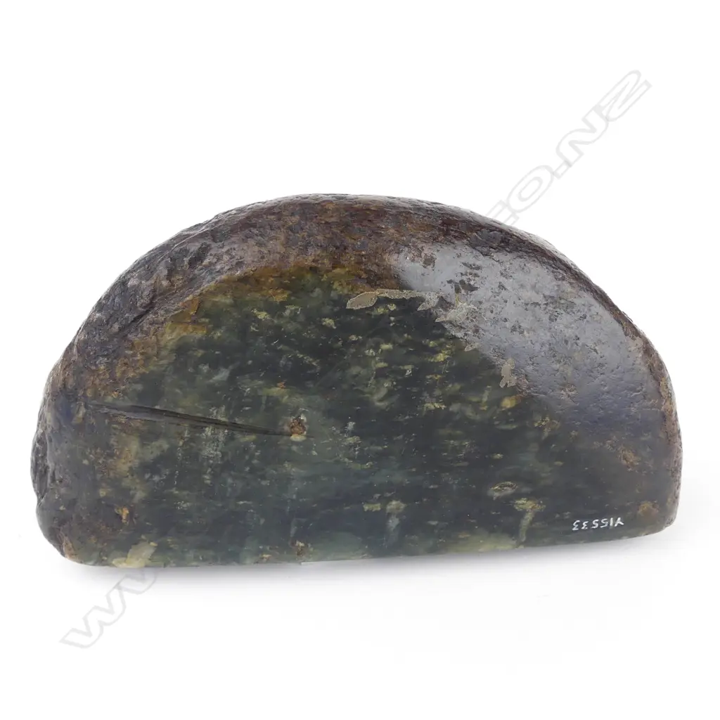 An old Maori stone tooled pounamu cobble Image 1++