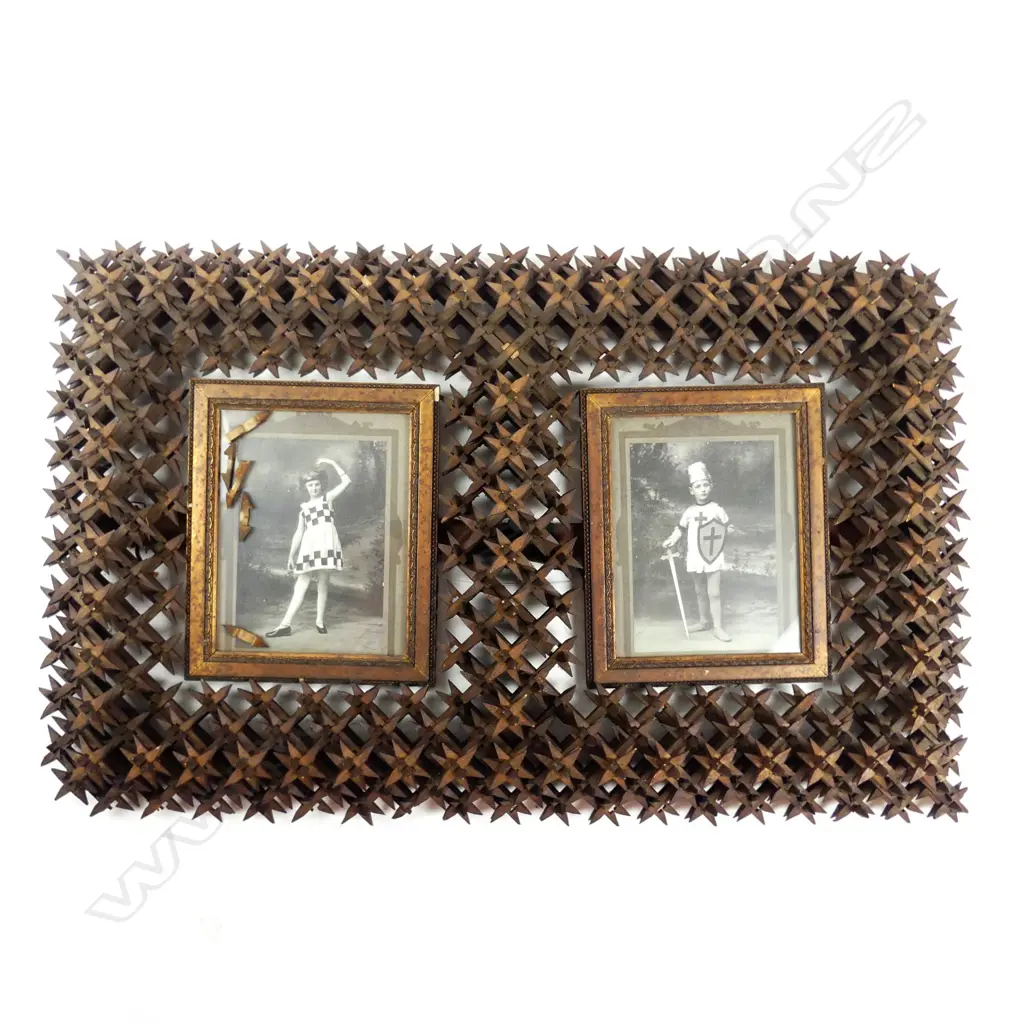 An antique 'tramp art' carved picture frame Image 1++