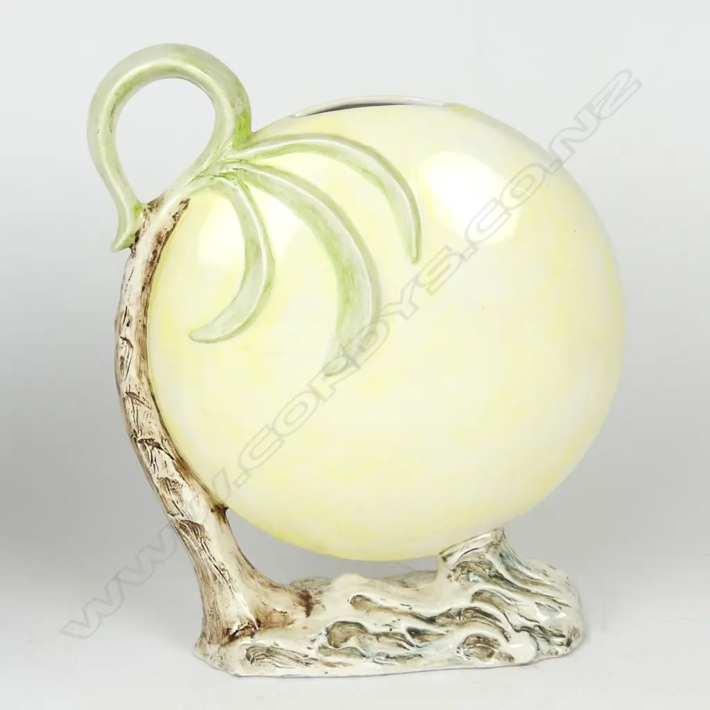 An uncommon large pottery moon and palm vase Image 1++