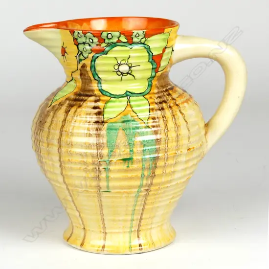 A Clarice Cliff Bizarre jug