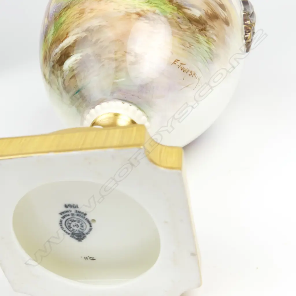 A large Royal Worcester two handled vase Image 1++