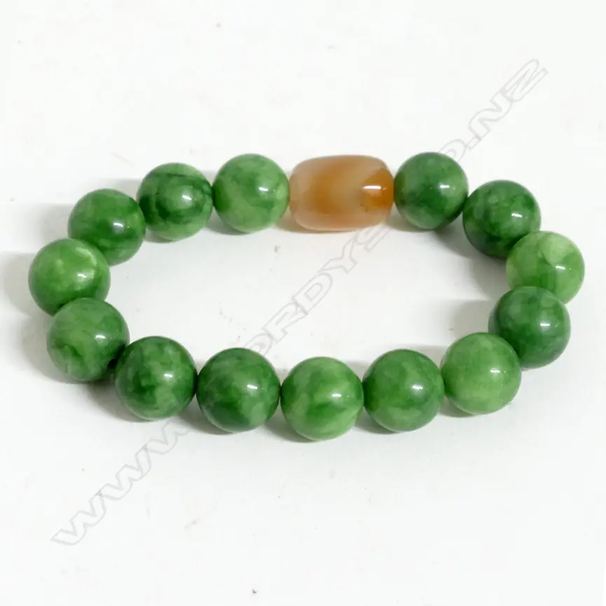 A bracelet of 14 jade mala beads Image 1++