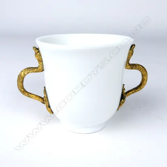 An old Chinese blanc-de-chine cup with ormolu handles