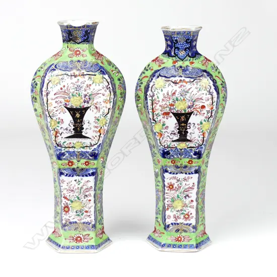 A pair of rare and interesting Kangxi period porcelain vases