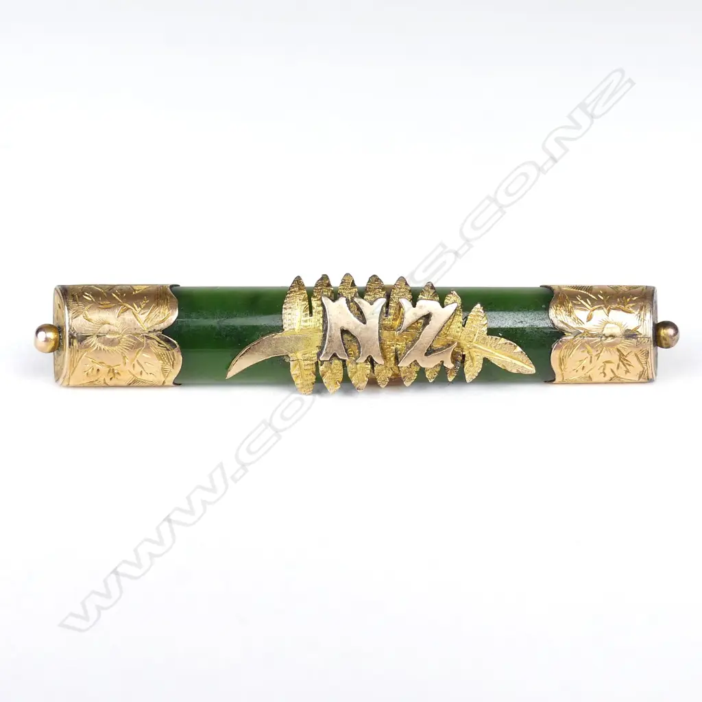 A colonial 9ct gold and greenstone bar brooch Image 1++