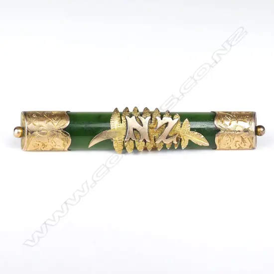 A colonial 9ct gold and greenstone bar brooch