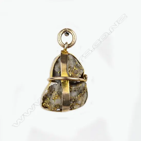 A c.1900 colonial gold bearing quartz nugget mounted gold pendant
