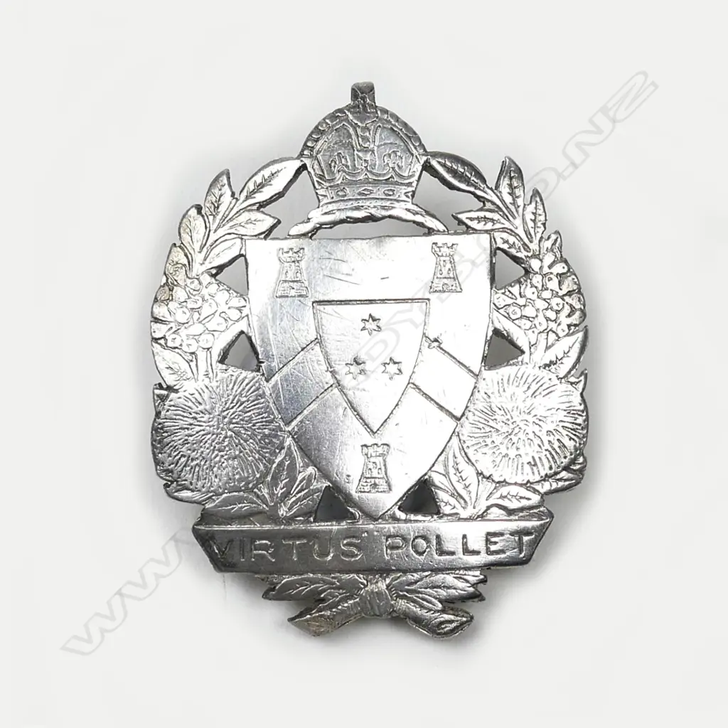 A 19th century silver cap badge for King’s College (Auckland) Image 1++