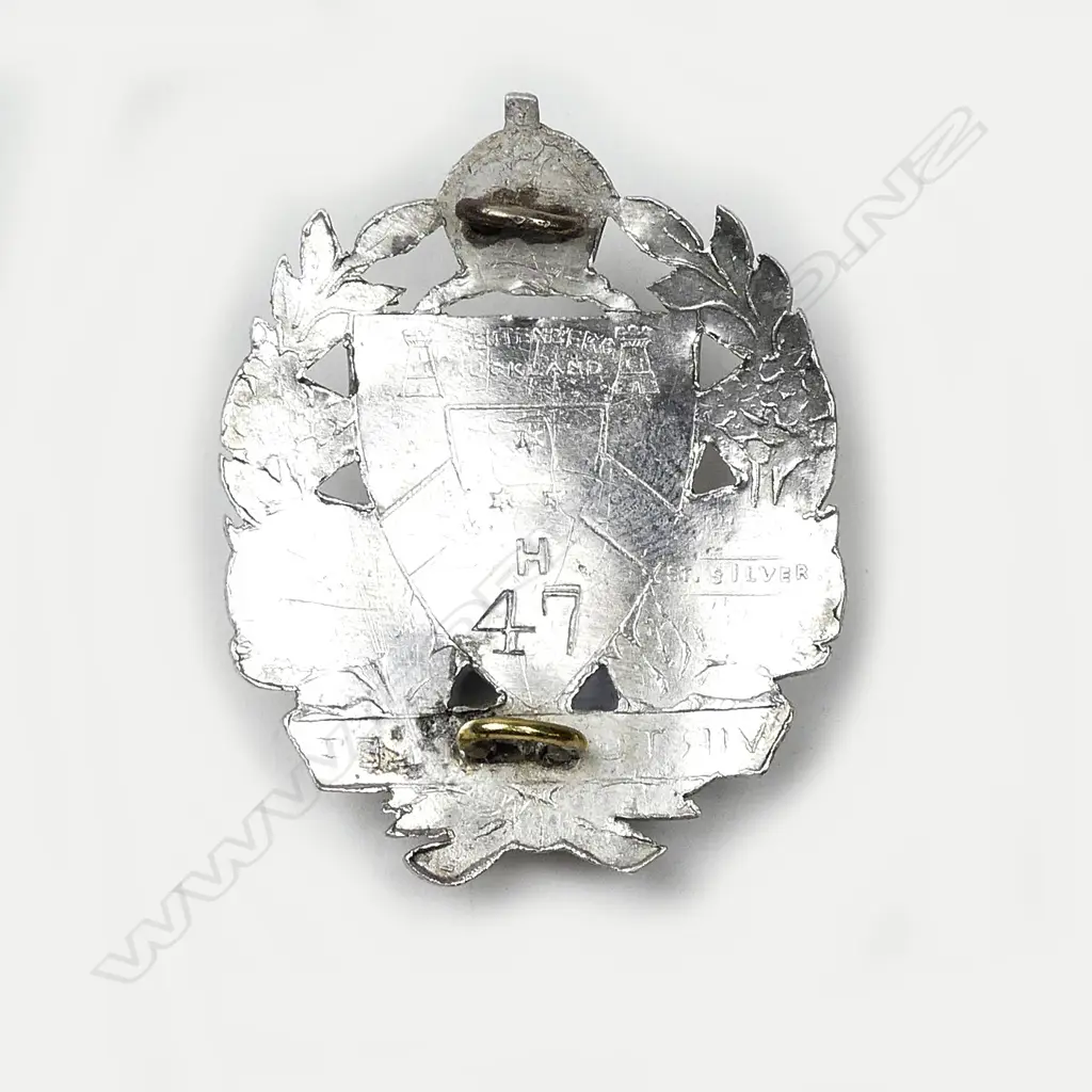 A 19th century silver cap badge for King’s College (Auckland) Image 1++