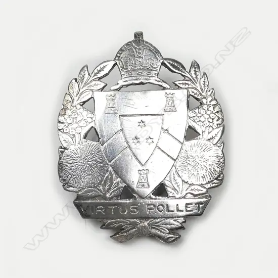 A 19th century silver cap badge for King’s College (Auckland)