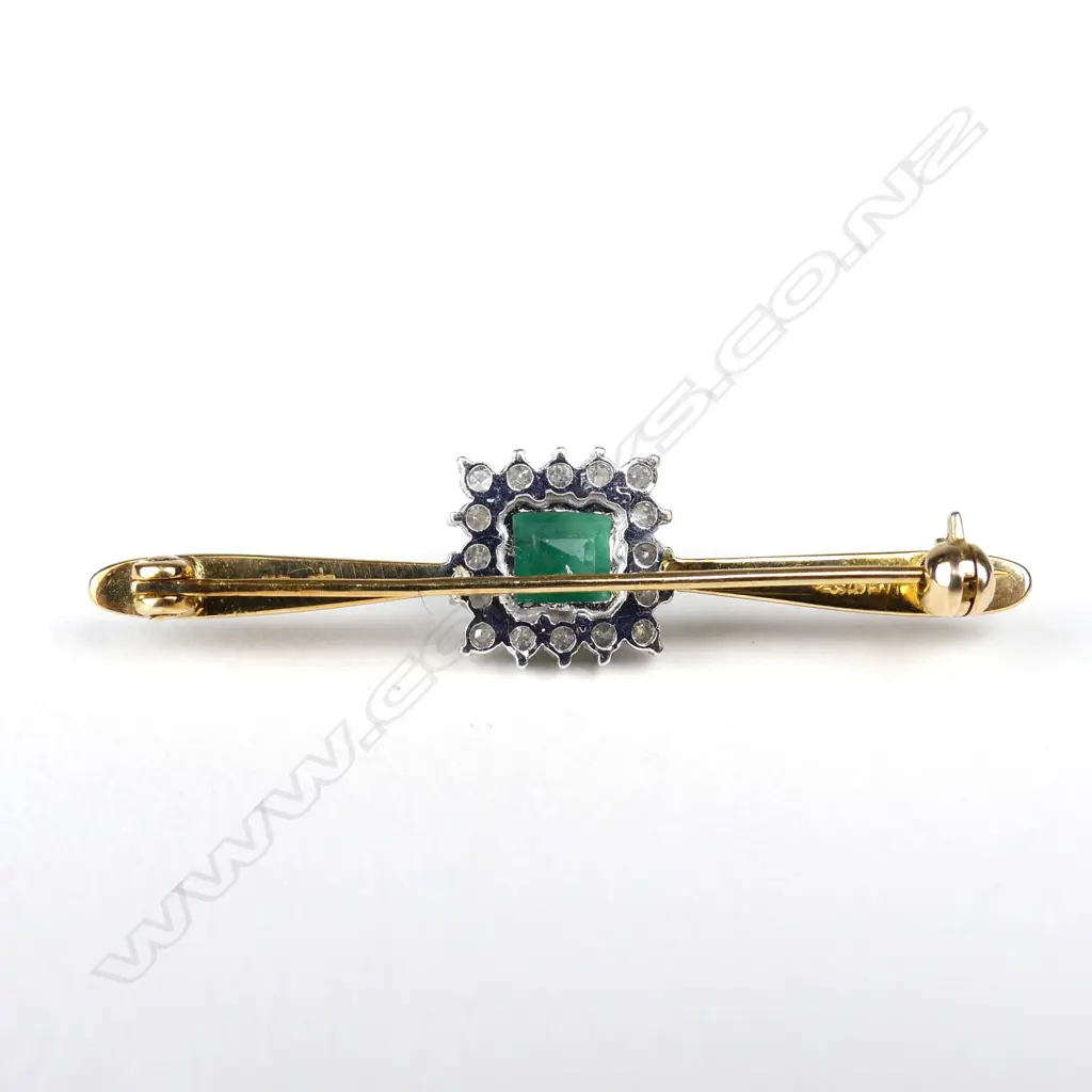 A 14ct gold emerald and diamond bar brooch Image 1++