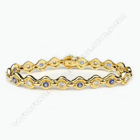 An 18ct gold sapphire and diamond bracelet