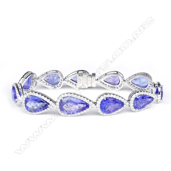 An 18ct white gold tanzanite and diamond bracelet