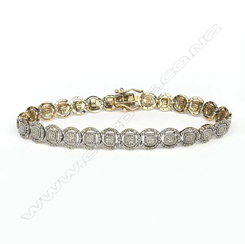 A 9ct gold and diamond bracelet Image 1++